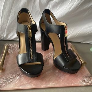 Michael Kors Black heels with gold zipper